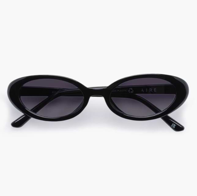 Fornax 53mm oval sunglasses with glossy black frames and dark lenses, minimal Y2K-inspired shape for sleek goth styling